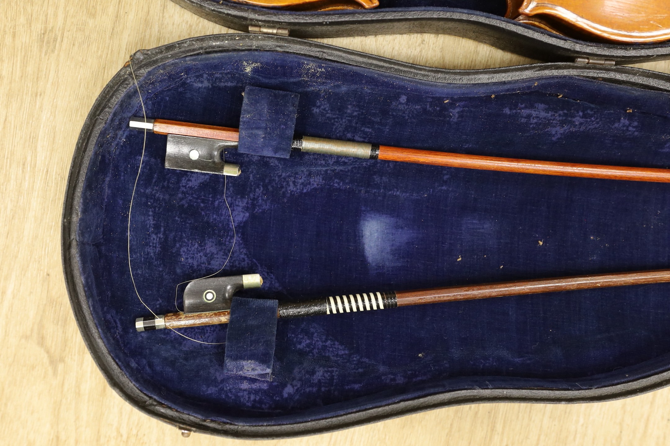 A violin, labelled Luigi Salsedo, with two bows, in case